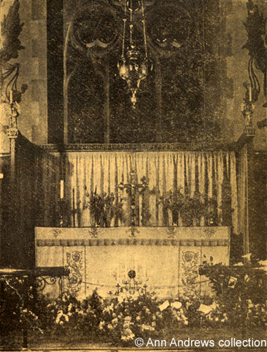decorated altar and wall paintings