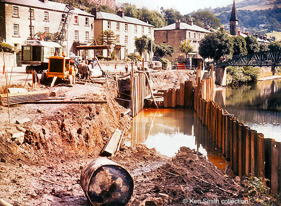 Preparatory work. Digging out the river bed and putting in the piles