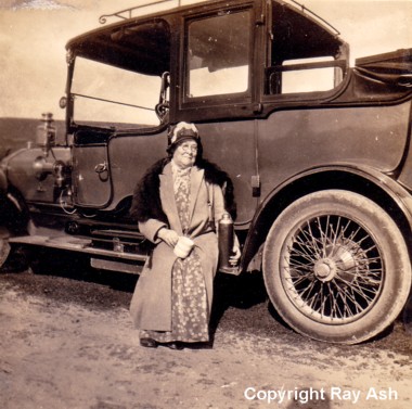 Portrait of Mrs. Robert Wildgoose (Marian Elizabeth) seated on the running board of her car. Mrs. Wildgoose employed a chauffeur to drive the car. Image Scan © Ray Ash